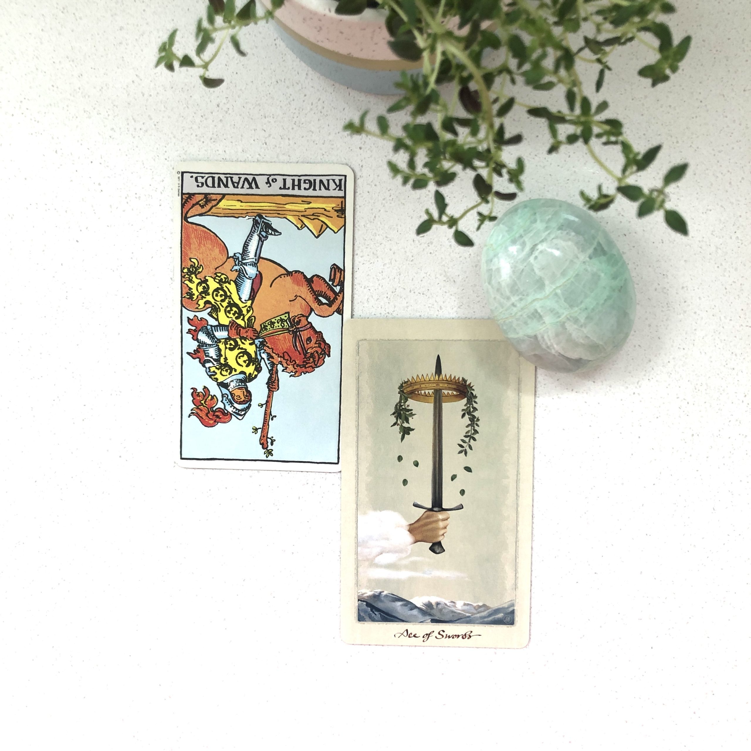 Tarot spread with the fool and the ace of swords